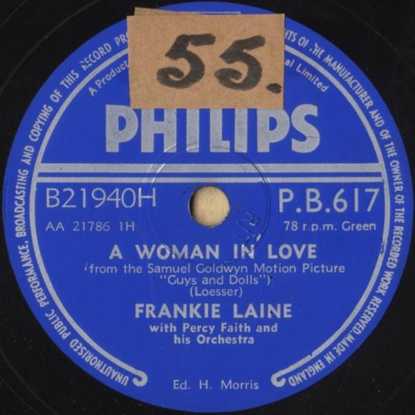 Frankie Laine - A Woman In Love / Make Me A Child Again